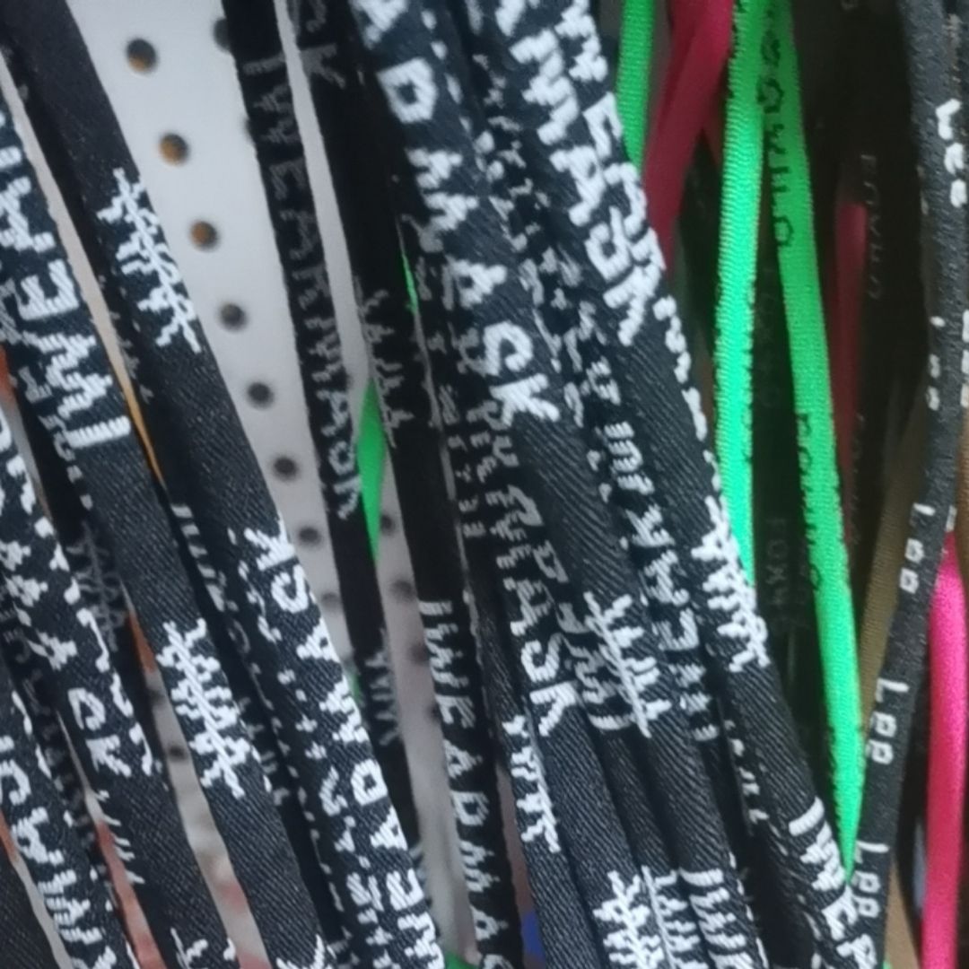 Tubular Polyester woven cord lanyard with metal clamp.