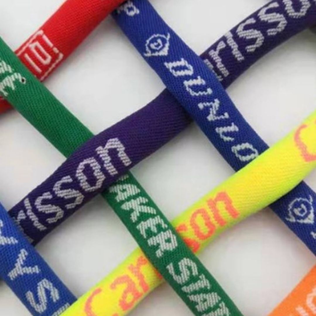 Tubular Polyester woven cord lanyard with metal clamp.